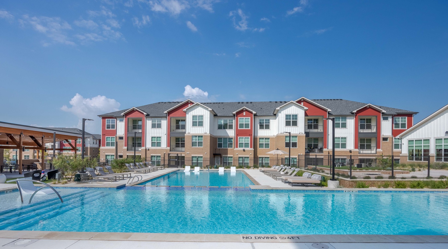 resort style pool and view of the building