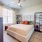 spacious bedroom with large window at Sendero Trace