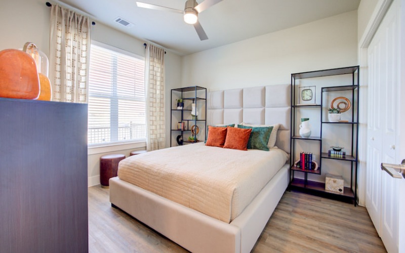 spacious bedroom with large window at Sendero Trace