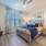 spacious bedroom with large window